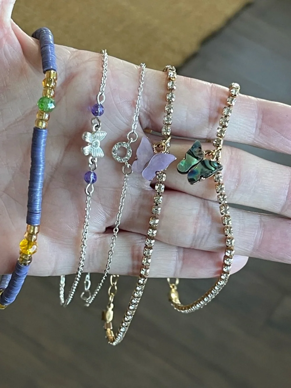 Set of 5 Ankle Bracelets.  Butterfly/Rhinestone theme.